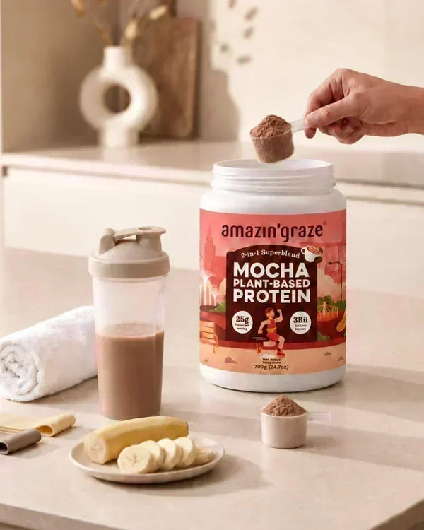 Amazin’ Graze Mocha Protein Blend pouch displayed with scoop and glass of blended protein shake.