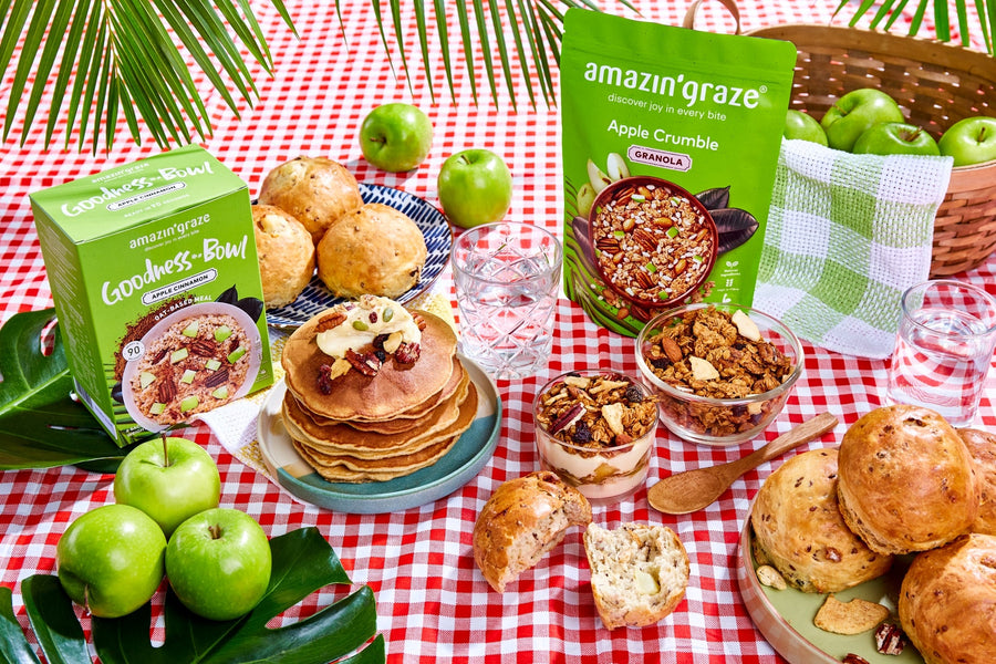 Amazin’ Graze Apple Crumble Granola and Goodness Bowl served with pancakes, apples, and breakfast sides.