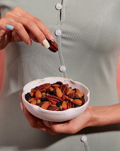 Amazin’ Graze nut mix served in a bowl for a simple office pantry wellness snack.